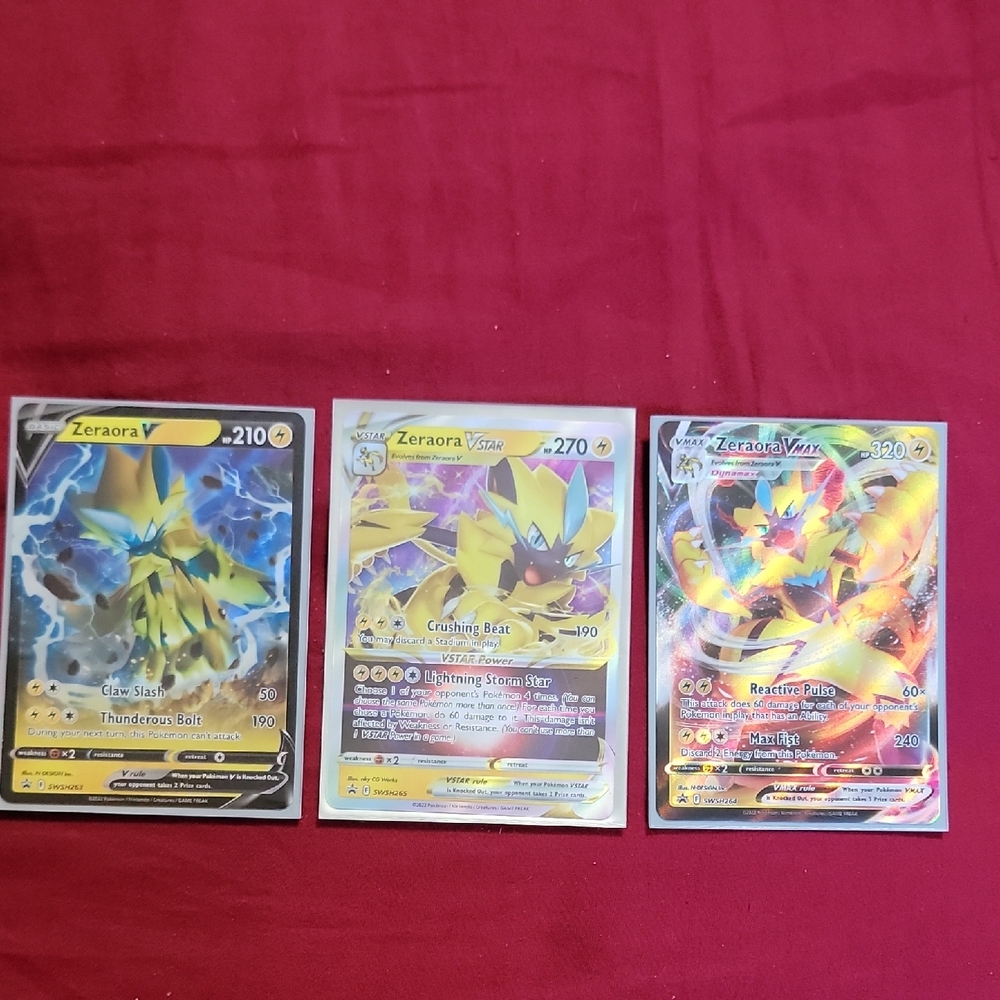 Three Pokemon Cards. Zeraora V , Vstar , And Vmax
